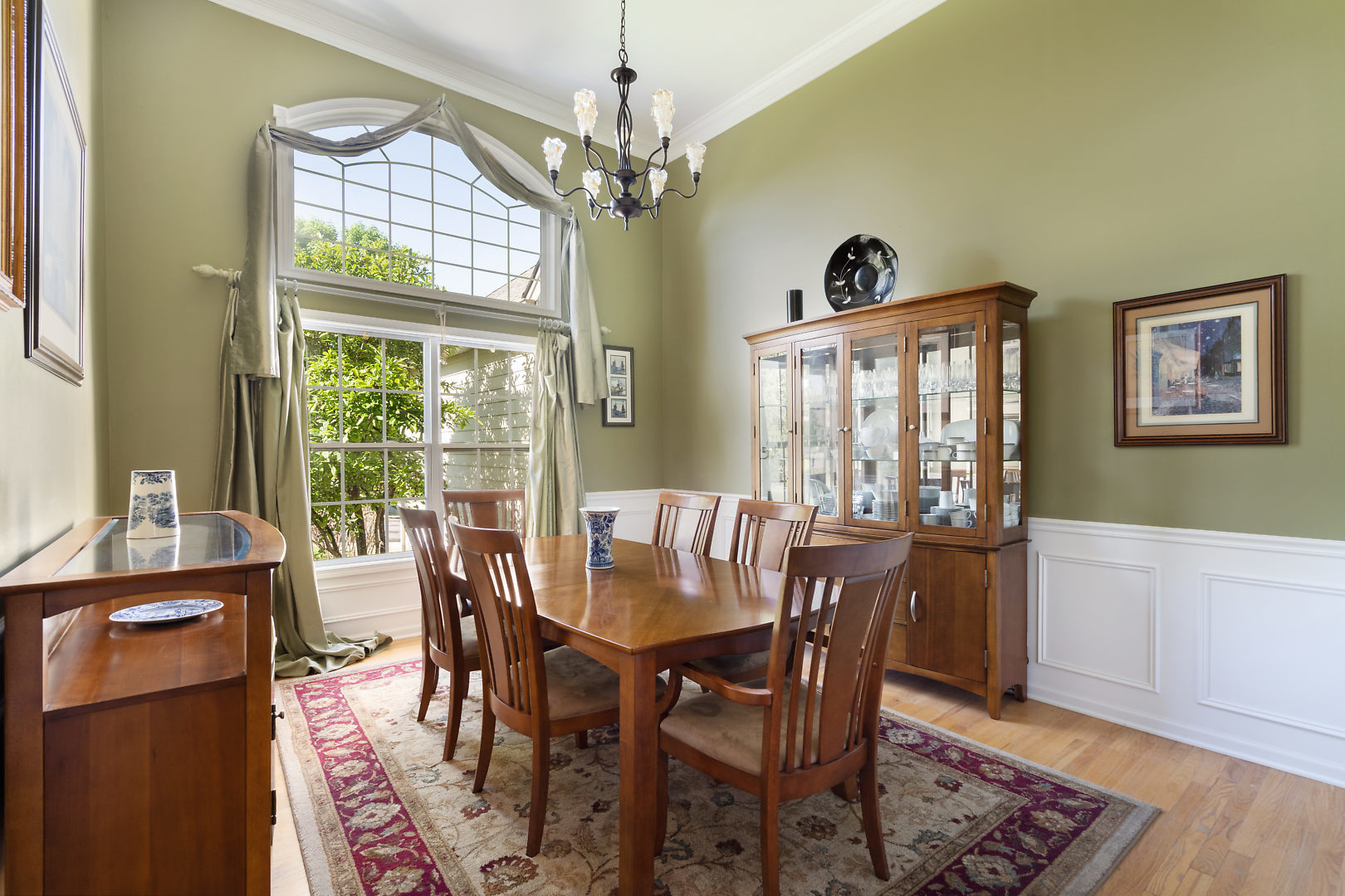 14 Winthrop New Road Sugar Grove, IL 60554 - Photo 7 of 25 a dining room with furniture a chandelier and wooden floor