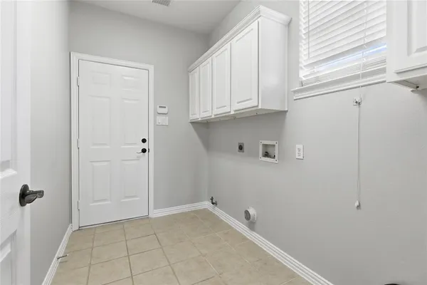 a kitchen with stainless steel appliances granite countertop a sink counter space and cabinets
