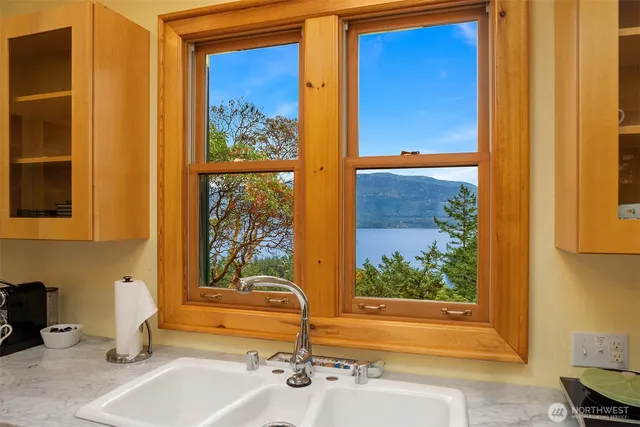 a bathroom with a tub and a sink