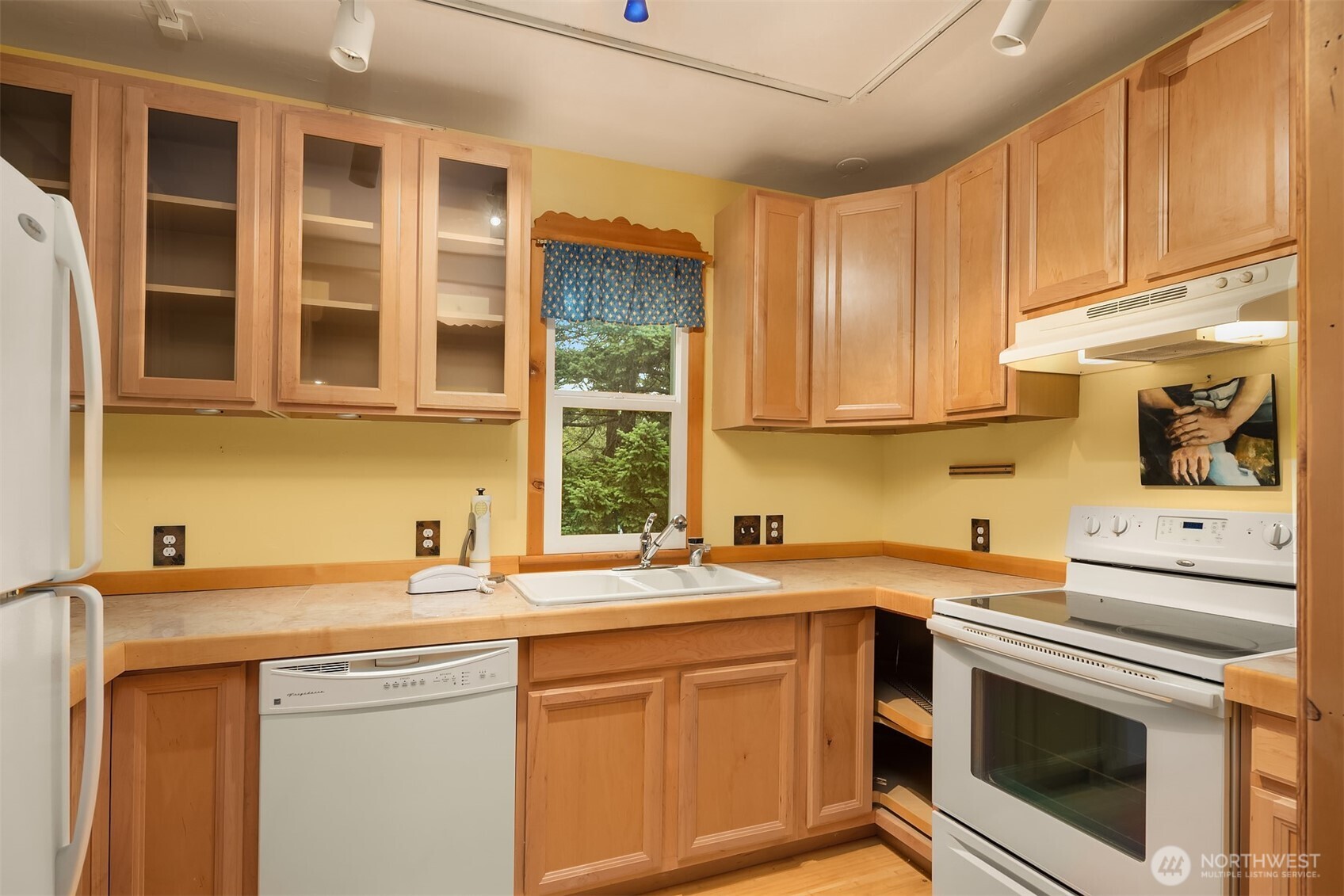 223 Blanc Road Orcas Island, WA 98245 - Photo 28 of 40 a kitchen with stainless steel appliances granite countertop a sink a stove and cabinets