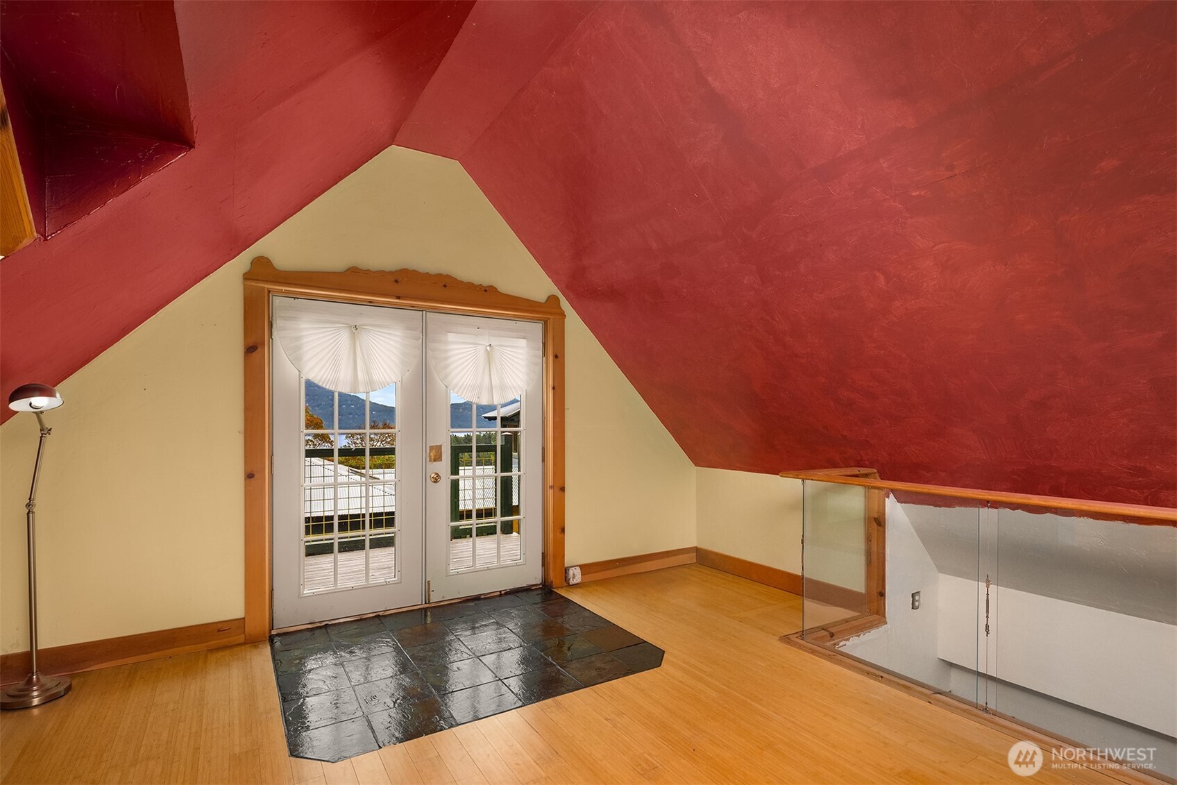 223 Blanc Road Orcas Island, WA 98245 - Photo 29 of 40 a view of an empty room with wooden floor