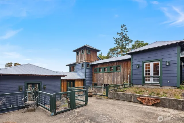 a view of a chairs and table in a patio