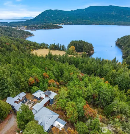 an aerial view of a house with outdoor space