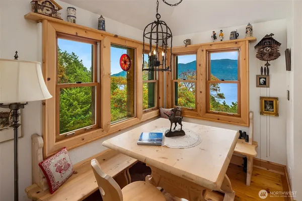 a view of a dining room with furniture window and outside view