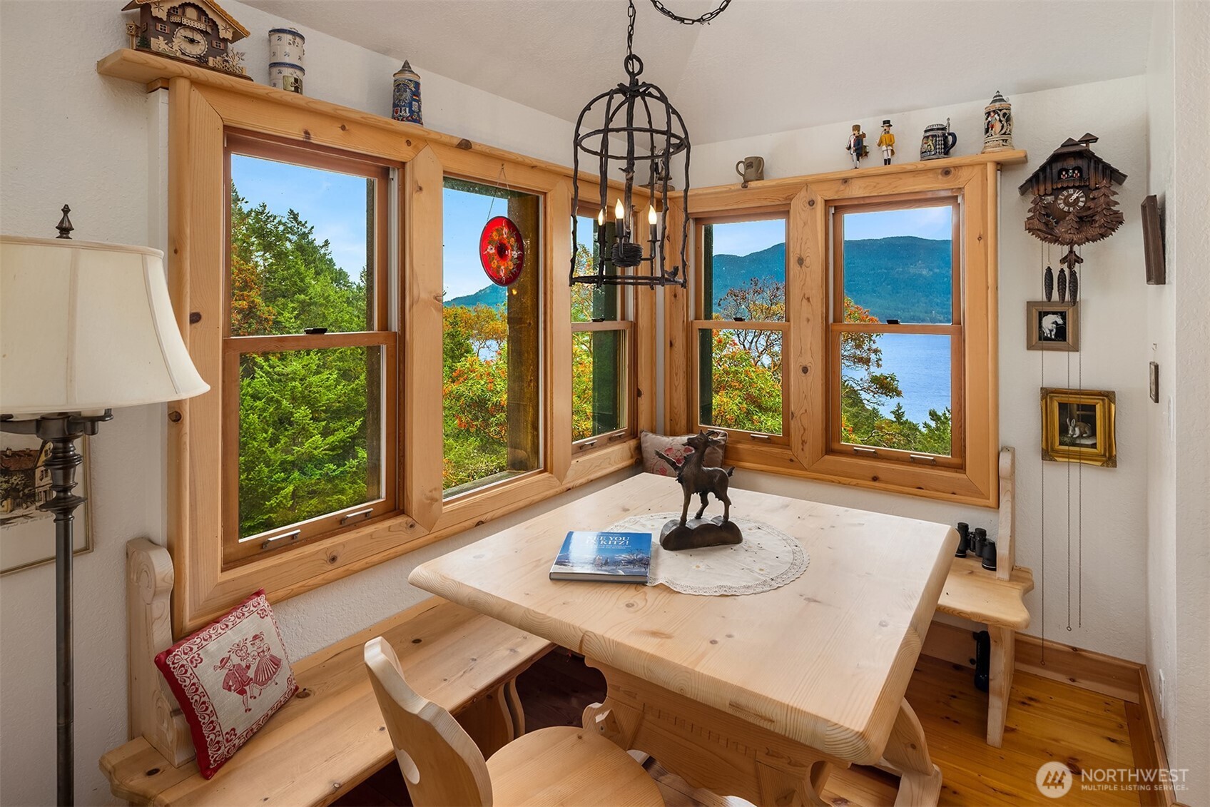 223 Blanc Road Orcas Island, WA 98245 - Photo 7 of 40 a view of a dining room with furniture window and outside view