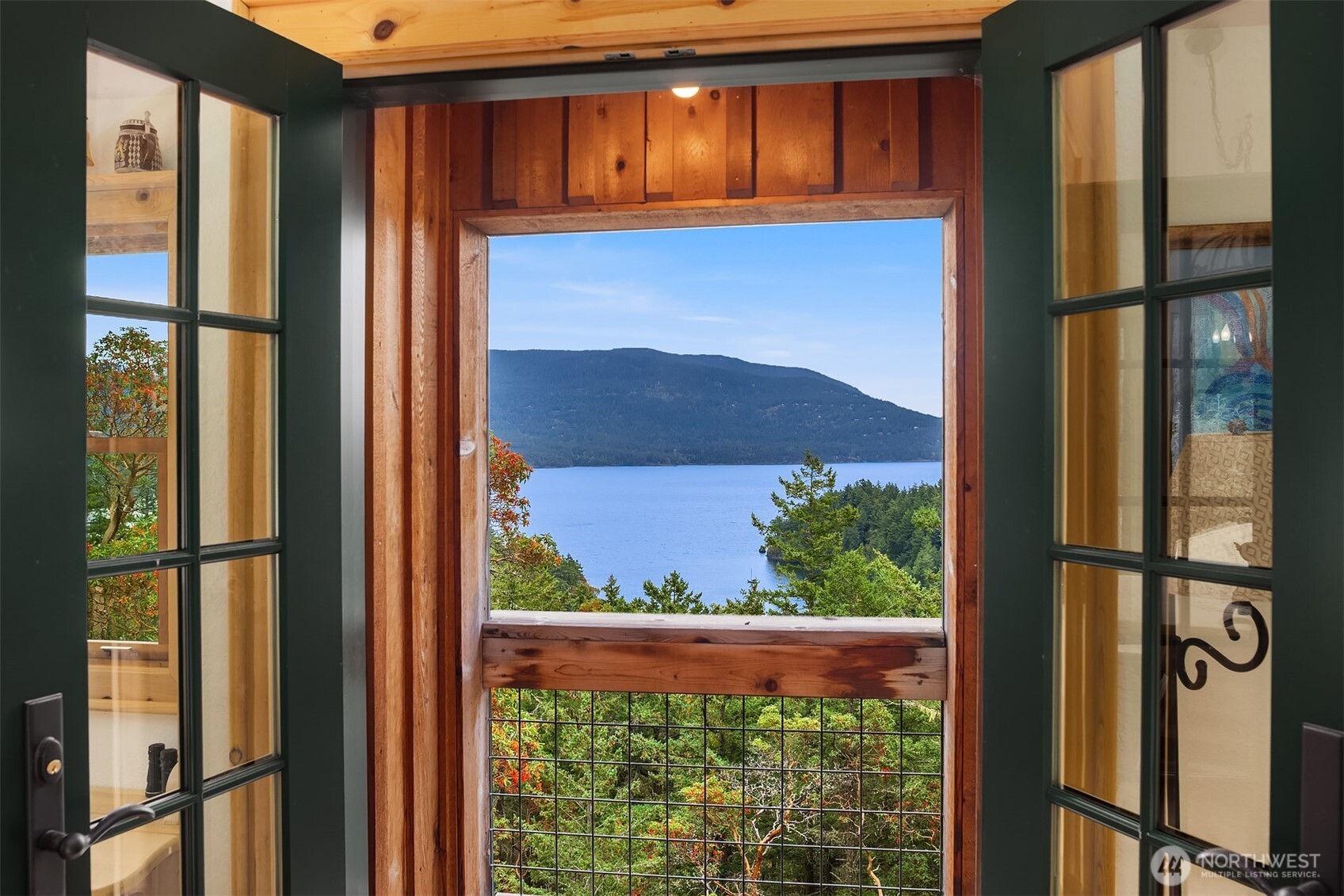 223 Blanc Road Orcas Island, WA 98245 - Photo 8 of 40 a view of a balcony from a window
