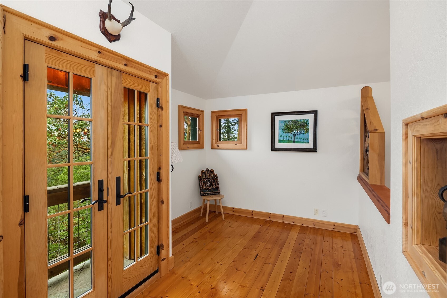 223 Blanc Road Orcas Island, WA 98245 - Photo 9 of 40 a view of front door with wooden floor