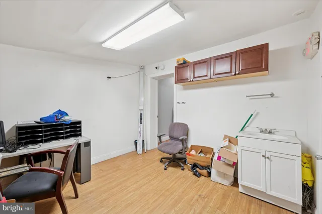 a room with furniture and wooden floor