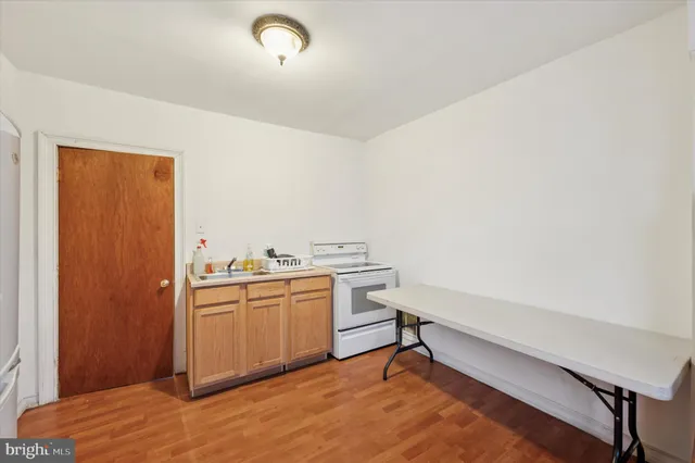 a view of workspace with wooden floor