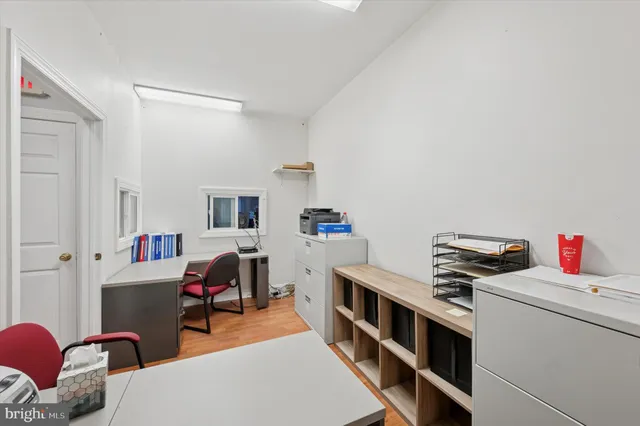 a room with furniture and a window