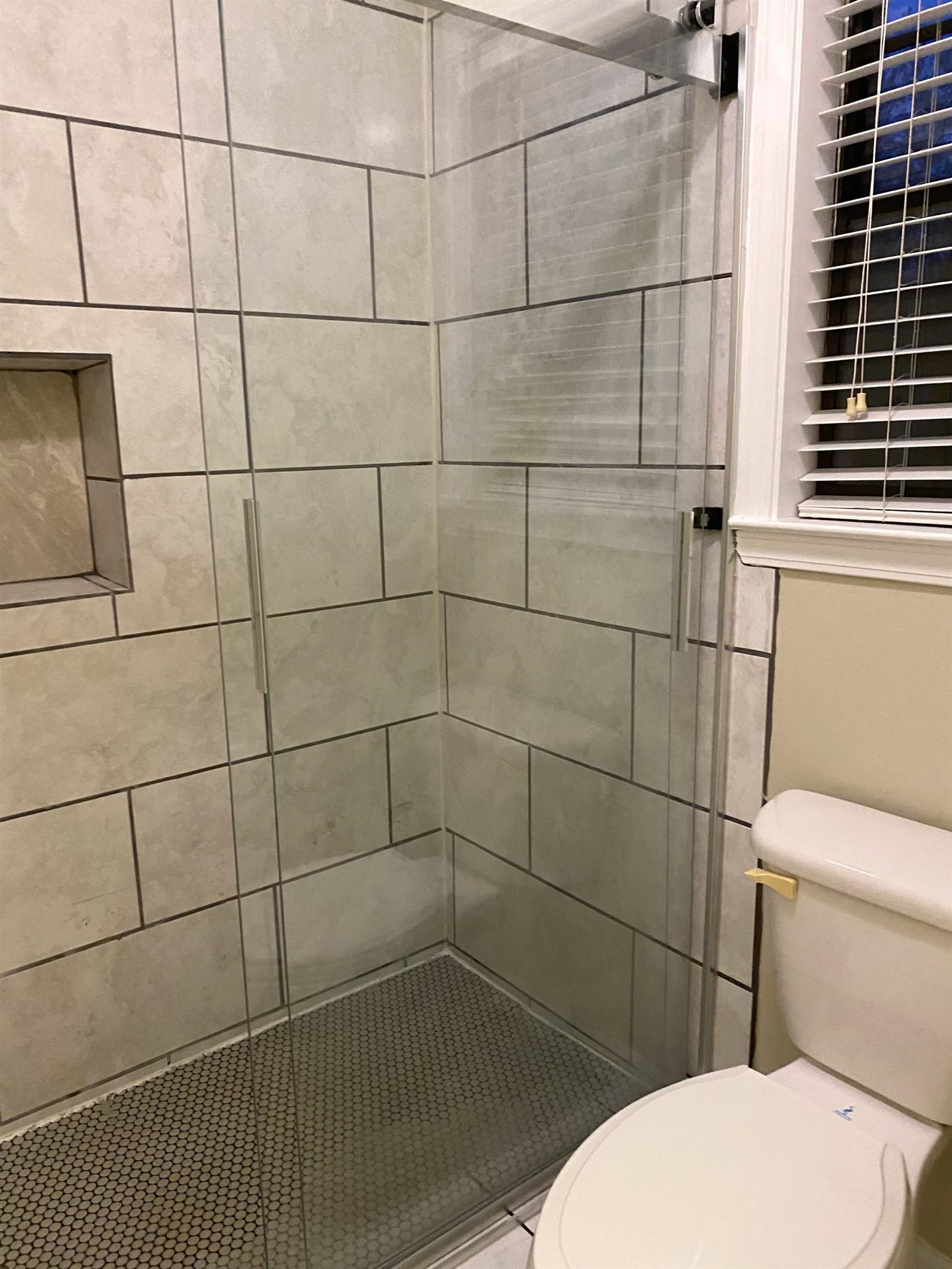 7918 Farmingdale Road Germantown, TN 38138 - Photo 7 of 12 Bathroom featuring toilet and walk in shower
