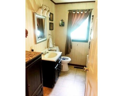 80 Herrman Street West Springfield, MA 01089 - Photo 11 of 19 a bathroom with a sink and a mirror