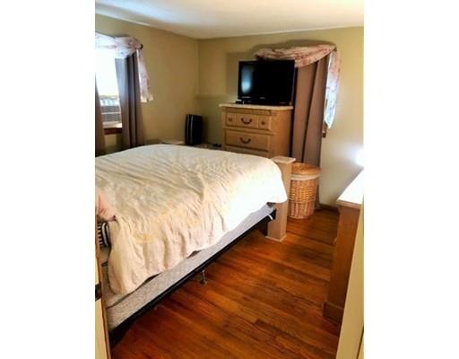 80 Herrman Street West Springfield, MA 01089 - Photo 12 of 19 a bedroom with a bed and a television