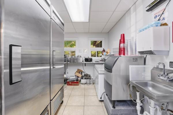 300 Main Street Volant, PA 16156 - Photo 14 of 31 a living room with furniture and a table