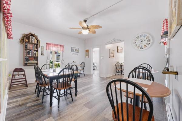 300 Main Street Volant, PA 16156 - Photo 19 of 31 a view of a a dining room with furniture window and wooden floor