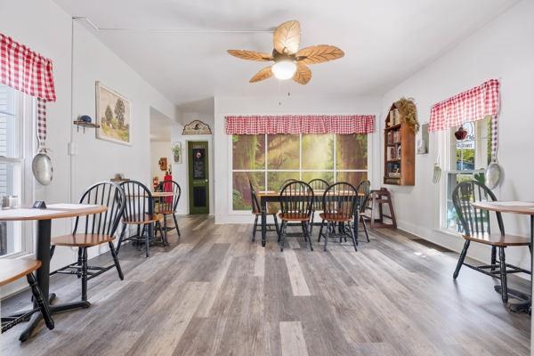 300 Main Street Volant, PA 16156 - Photo 20 of 31 a view of a dining room with furniture and wooden floor