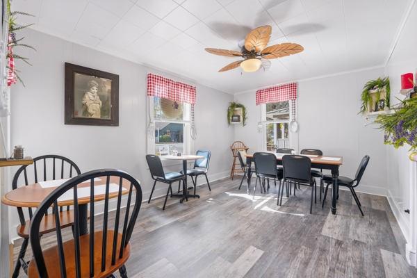 300 Main Street Volant, PA 16156 - Photo 21 of 31 a dining room with furniture a rug and wooden floor