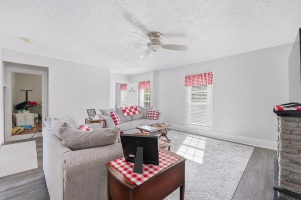 300 Main Street Volant, PA 16156 - Photo 25 of 31 a living room with furniture and a wooden floor