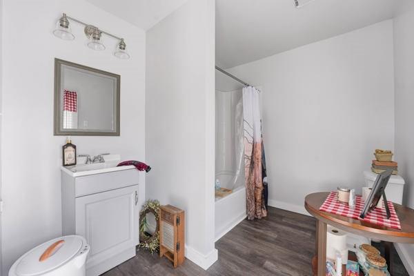 300 Main Street Volant, PA 16156 - Photo 30 of 31 a bathroom with a sink toilet and vanity
