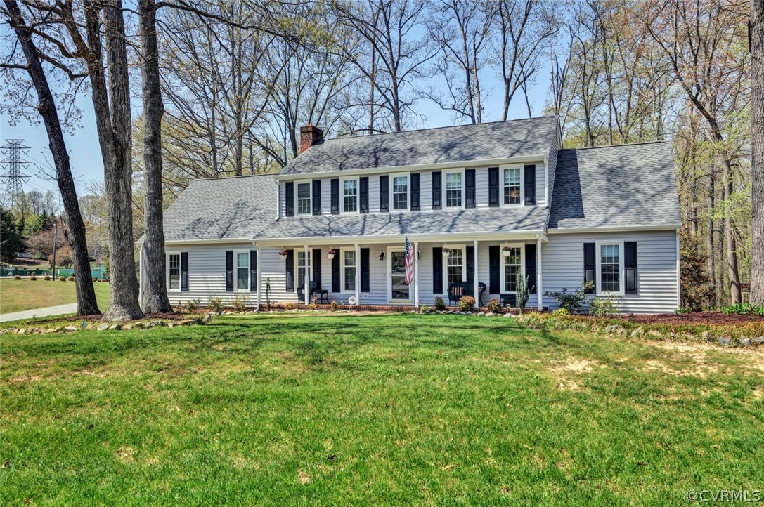 13400 Lady Ashley Road Midlothian, VA 23114 - Photo 1 of 31 a front view of a building with a garden