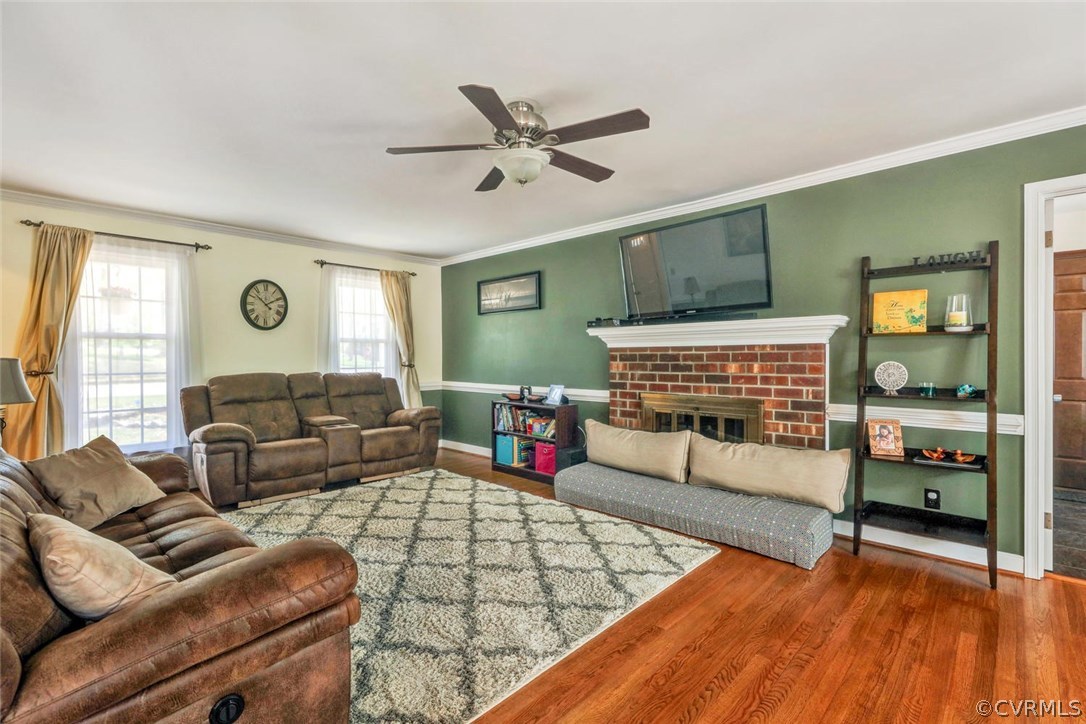 13400 Lady Ashley Road Midlothian, VA 23114 - Photo 3 of 31 a living room with furniture and a wooden floor
