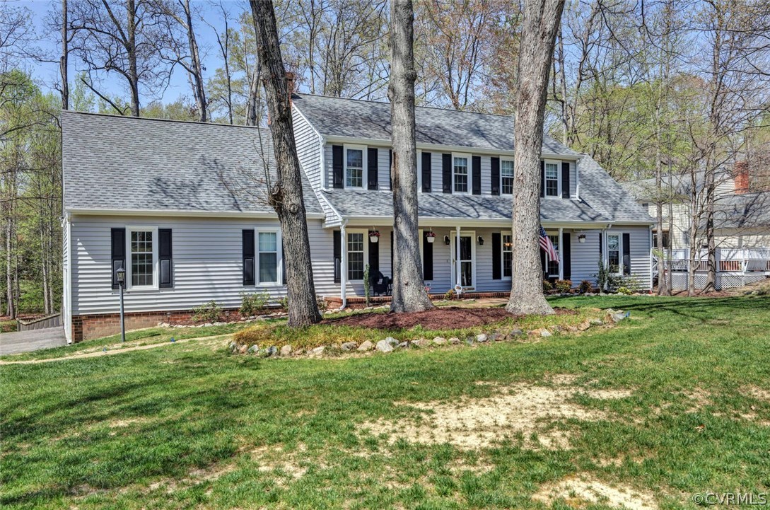 13400 Lady Ashley Road Midlothian, VA 23114 - Photo 31 of 31 a backyard of a house with yard table and chairs