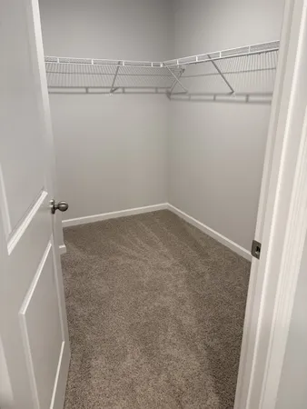 a view of a room with racks on the wall