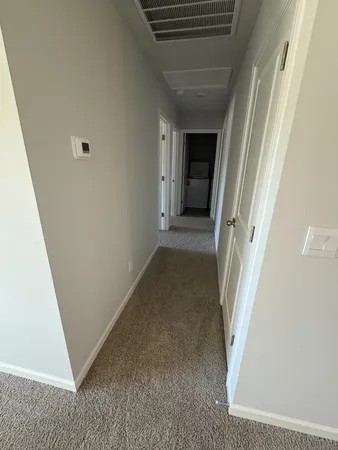 a view of a livingroom with a staircase