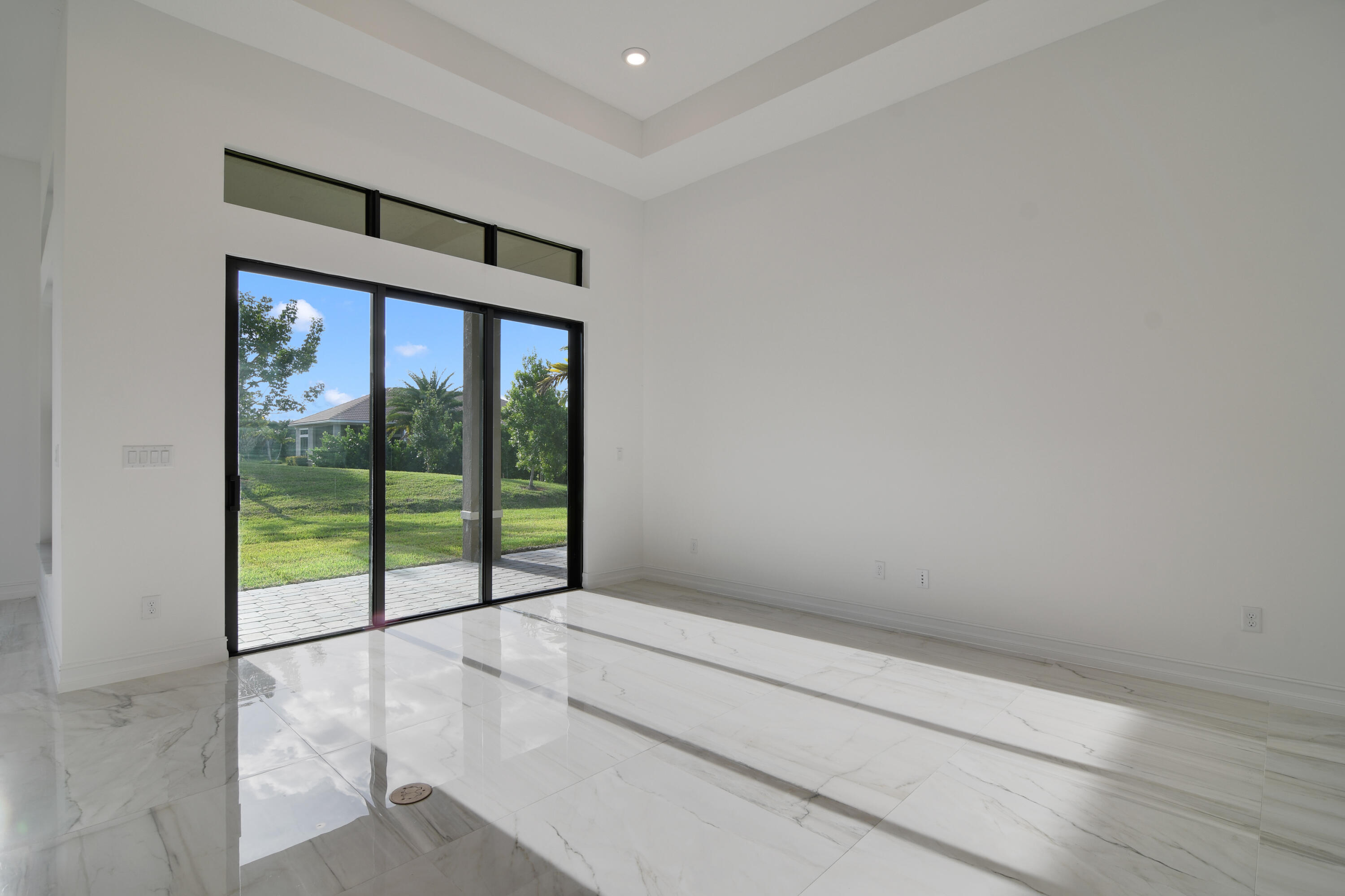 8827 Leon Circle, Unit 286 Parkland, FL 33076 - Photo 19 of 34 a view of an empty room with a window