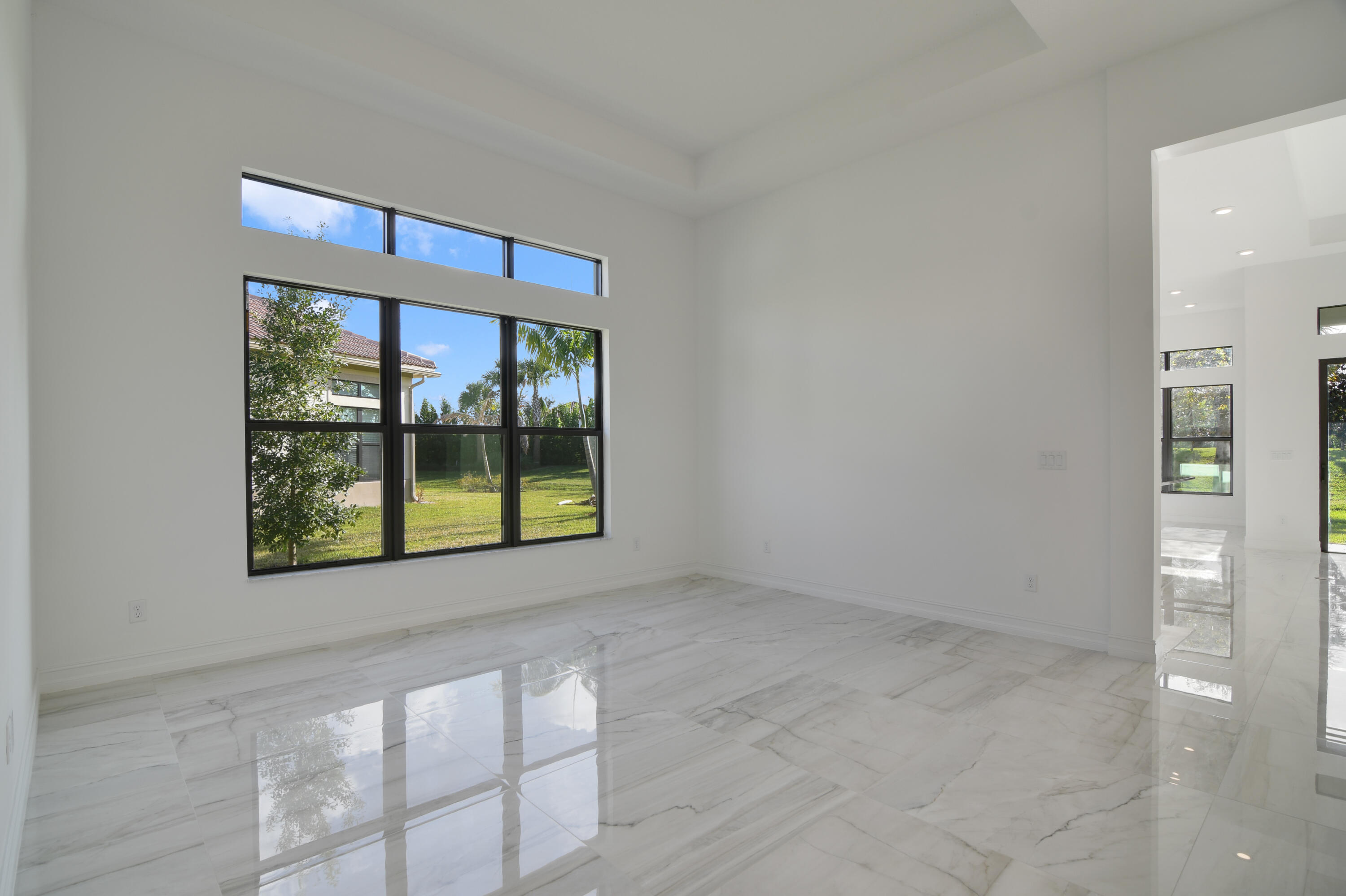 8827 Leon Circle, Unit 286 Parkland, FL 33076 - Photo 21 of 34 a view of an empty room with a window