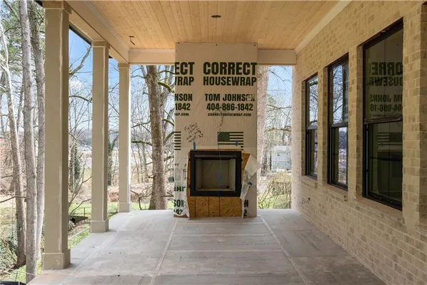 swimming pool view with a seating space