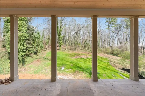 an aerial view of a house with outdoor space