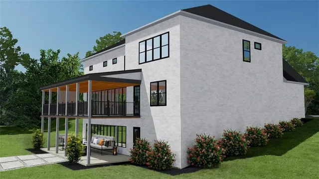 a view of a house with backyard and garden