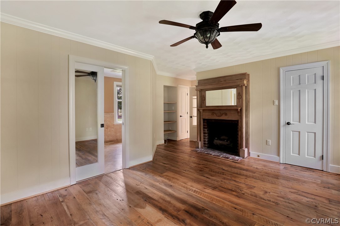 2620 Radstock Road Midlothian, VA 23113 - Photo 13 of 25 a view of an empty room with a fireplace and a window