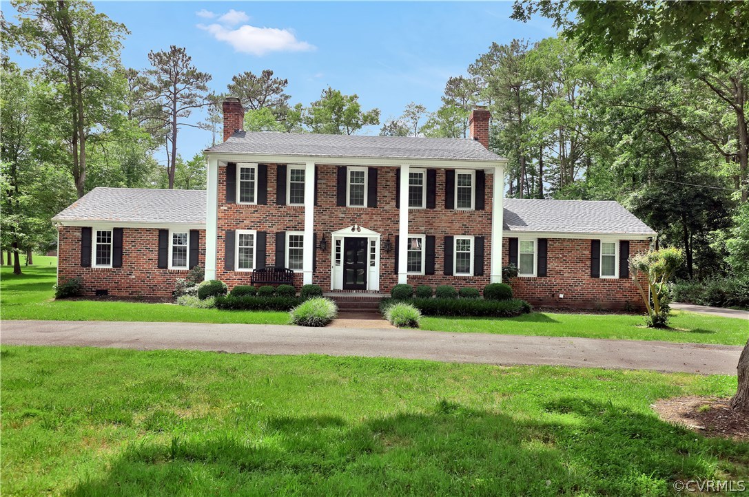 2620 Radstock Road Midlothian, VA 23113 - Photo 2 of 25 a front view of a house with a garden