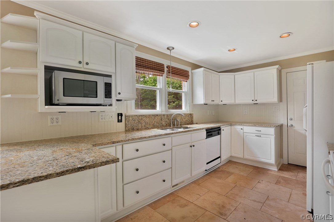 2620 Radstock Road Midlothian, VA 23113 - Photo 8 of 25 a kitchen with granite countertop white cabinets sink and stainless steel appliances