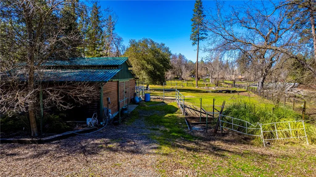 0 Wortham Road Oakhurst, CA 93644 - Photo 3 of 19 a view of a swimming pool with a patio and a yard