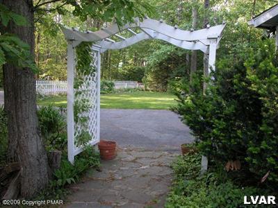 3633 T R 626 Cresco, PA 18326 - Photo 3 of 5 a view of a garden with a fountain