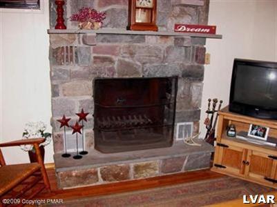 3633 T R 626 Cresco, PA 18326 - Photo 5 of 5 a living room with furniture and a fireplace