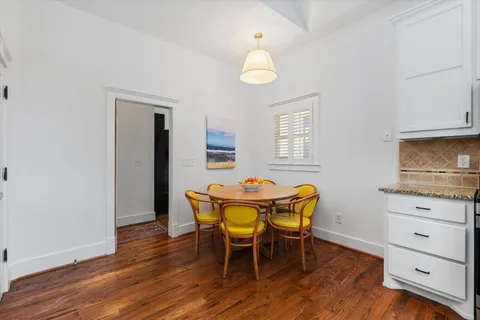 a bathroom with a shower and a sink