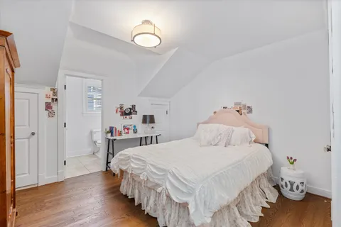 a kitchen with stainless steel appliances kitchen island granite countertop a stove a sink and a microwave