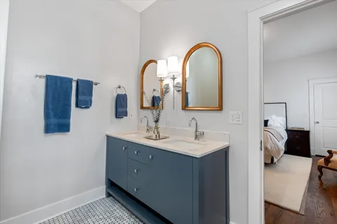 a view of a house with yard and tree s