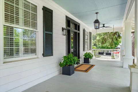 a bedroom with furniture and windows