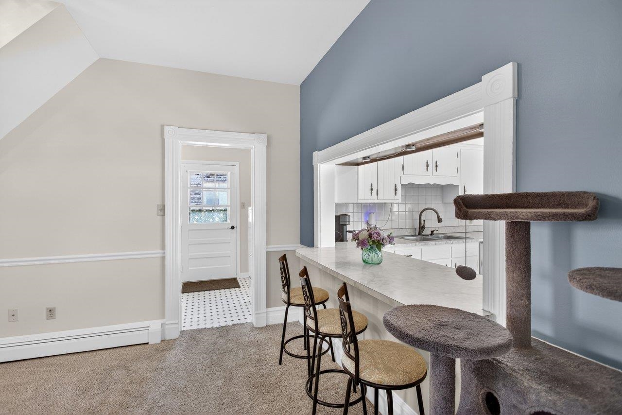 420 West Spring Street Woodstock, VA 22664 - Photo 24 of 67 a view of a dining room with furniture and a window