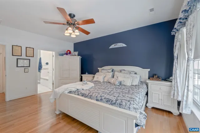 a view of a livingroom with furniture and a flat screen tv