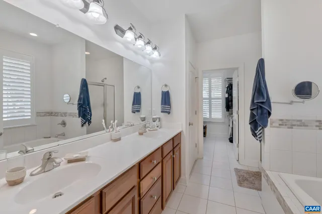 a living room with lots of furniture and a flat screen tv