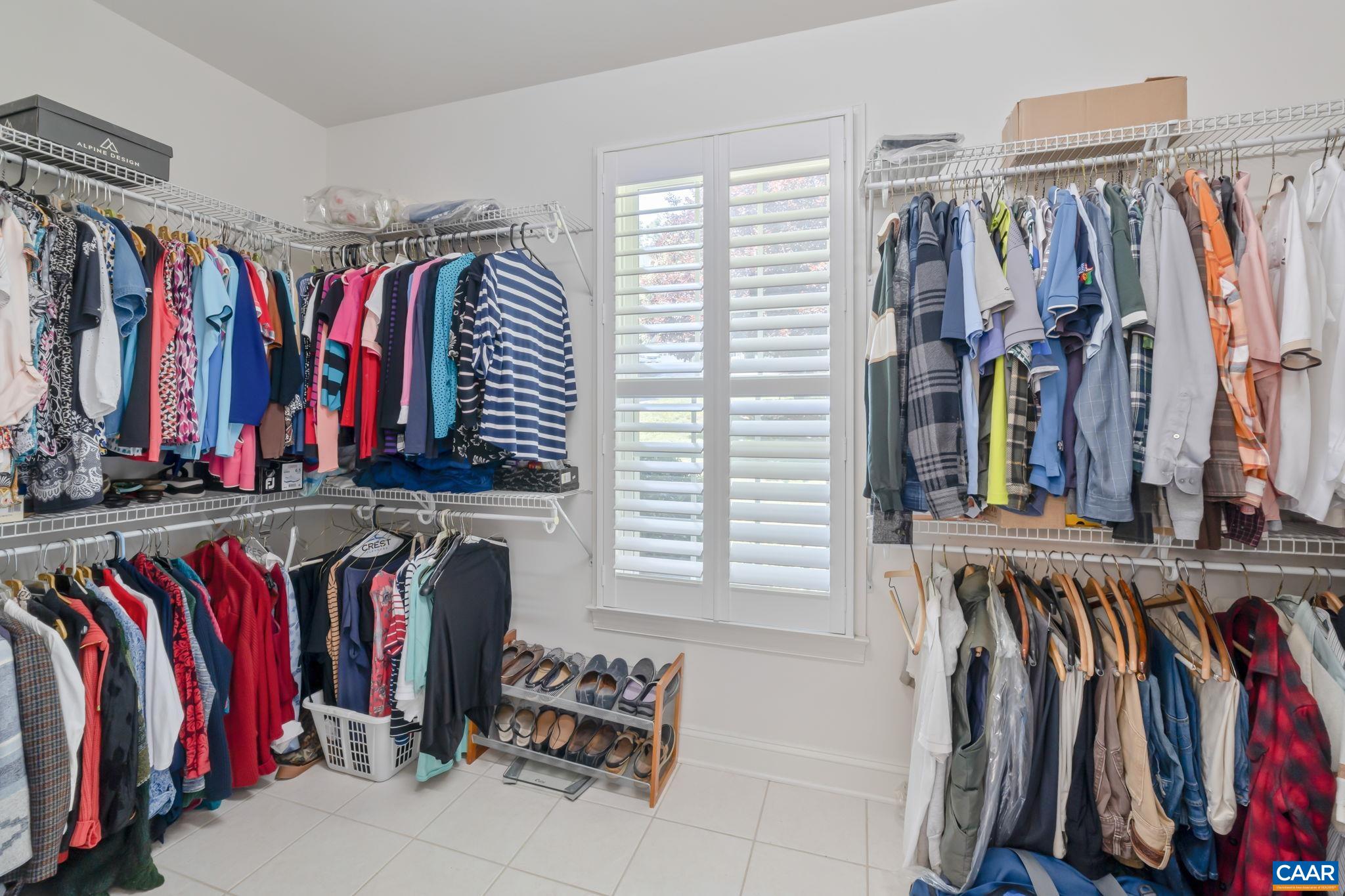 27 Kingswood Road Palmyra, VA 22963 - Photo 20 of 60 a view of walk in closet with clothes and shoes