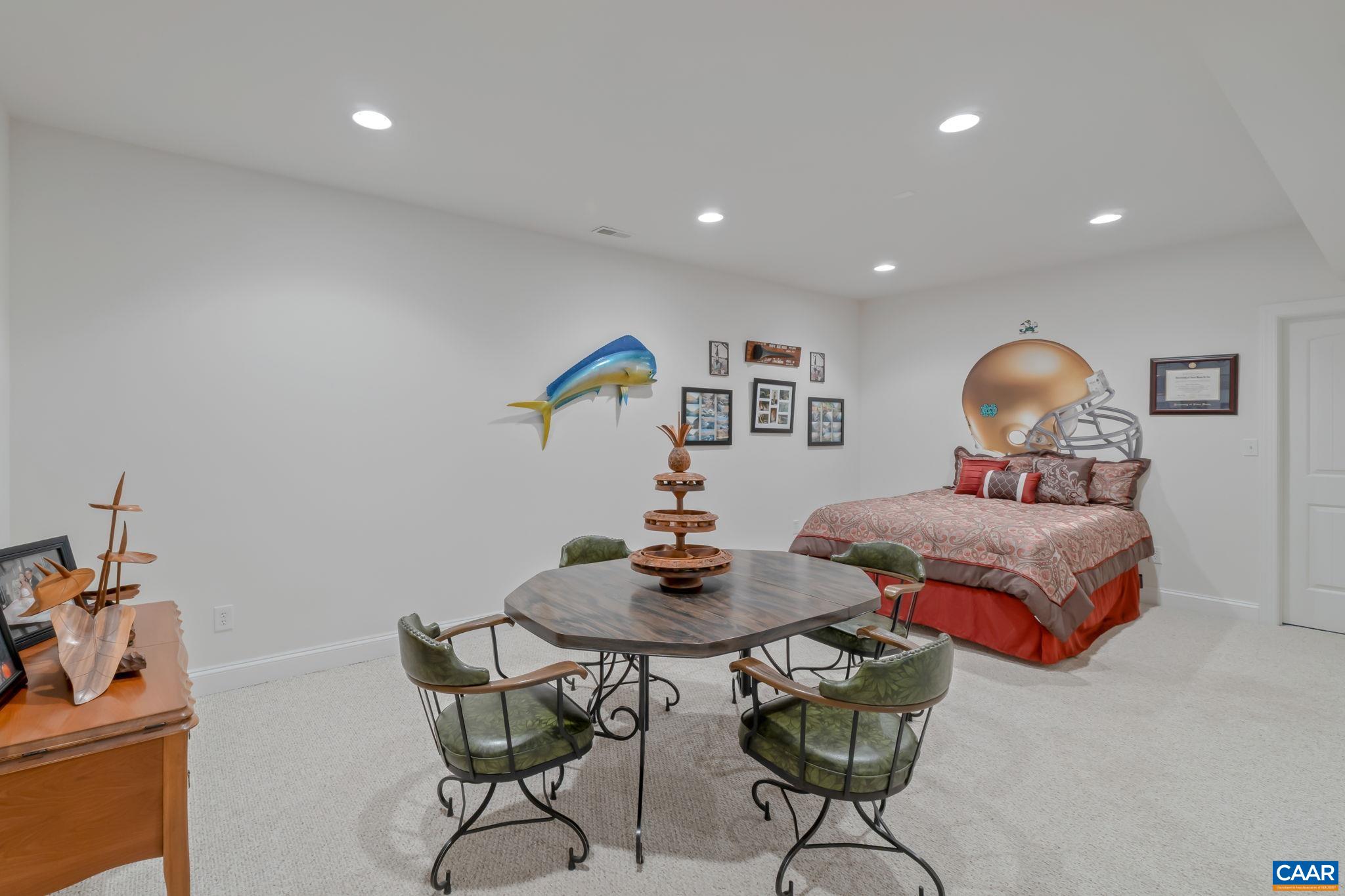 27 Kingswood Road Palmyra, VA 22963 - Photo 26 of 60 a living room with furniture and a chandelier