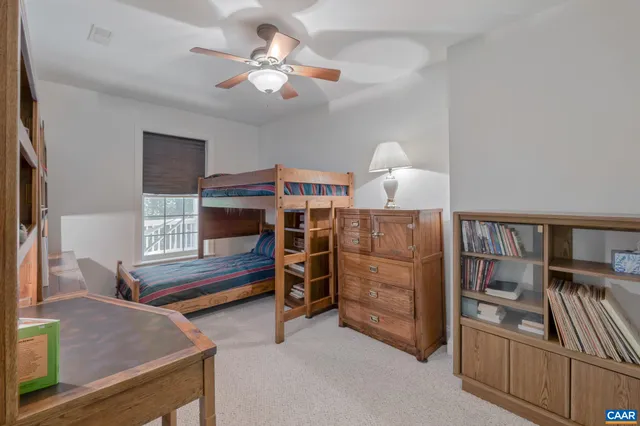 a view of a chair and table in the balcony
