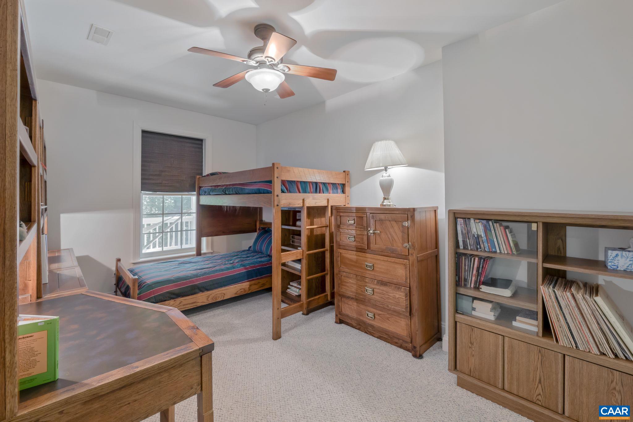 27 Kingswood Road Palmyra, VA 22963 - Photo 27 of 60 a bedroom with a bed and furniture